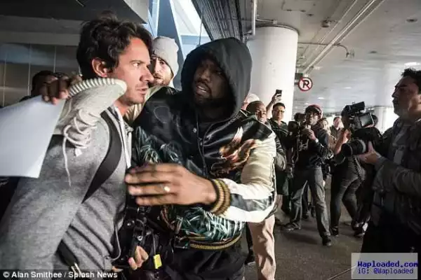 Photos: Kanye West Separates Two Fighting Photographers At LA Airport 